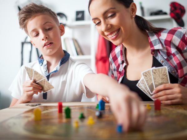 Family playing board game
