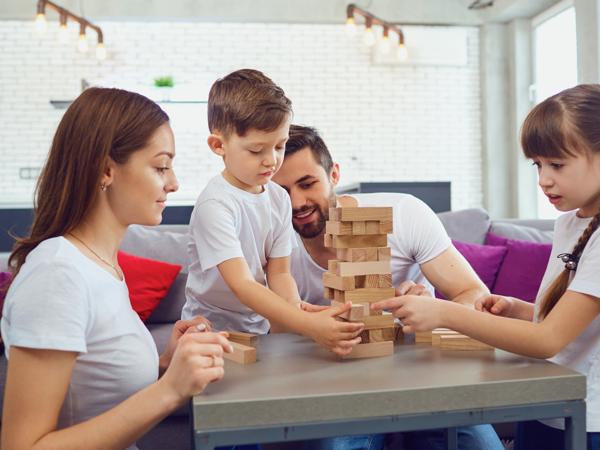 Family playing board game